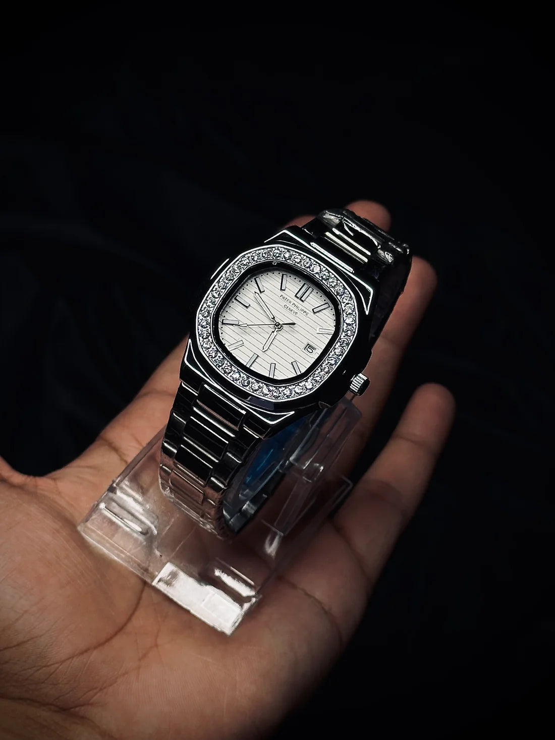 the Patek Philippe Silver Watch featuring a unique Stone Dial & Date. 